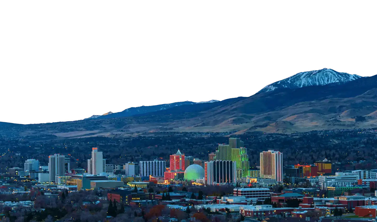 Reno Nevada downtown skyline with colorful casinos and mountain view, showcasing commercial electrical services